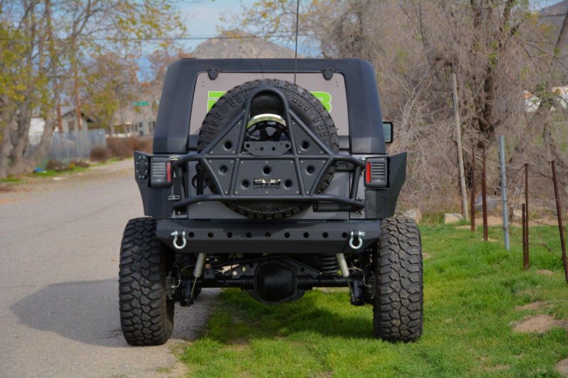Jeep Wrangler Spare Tire Carrier - DV8 Offroad - Body Mount Tire Carrier - Textured Black - `07-`18